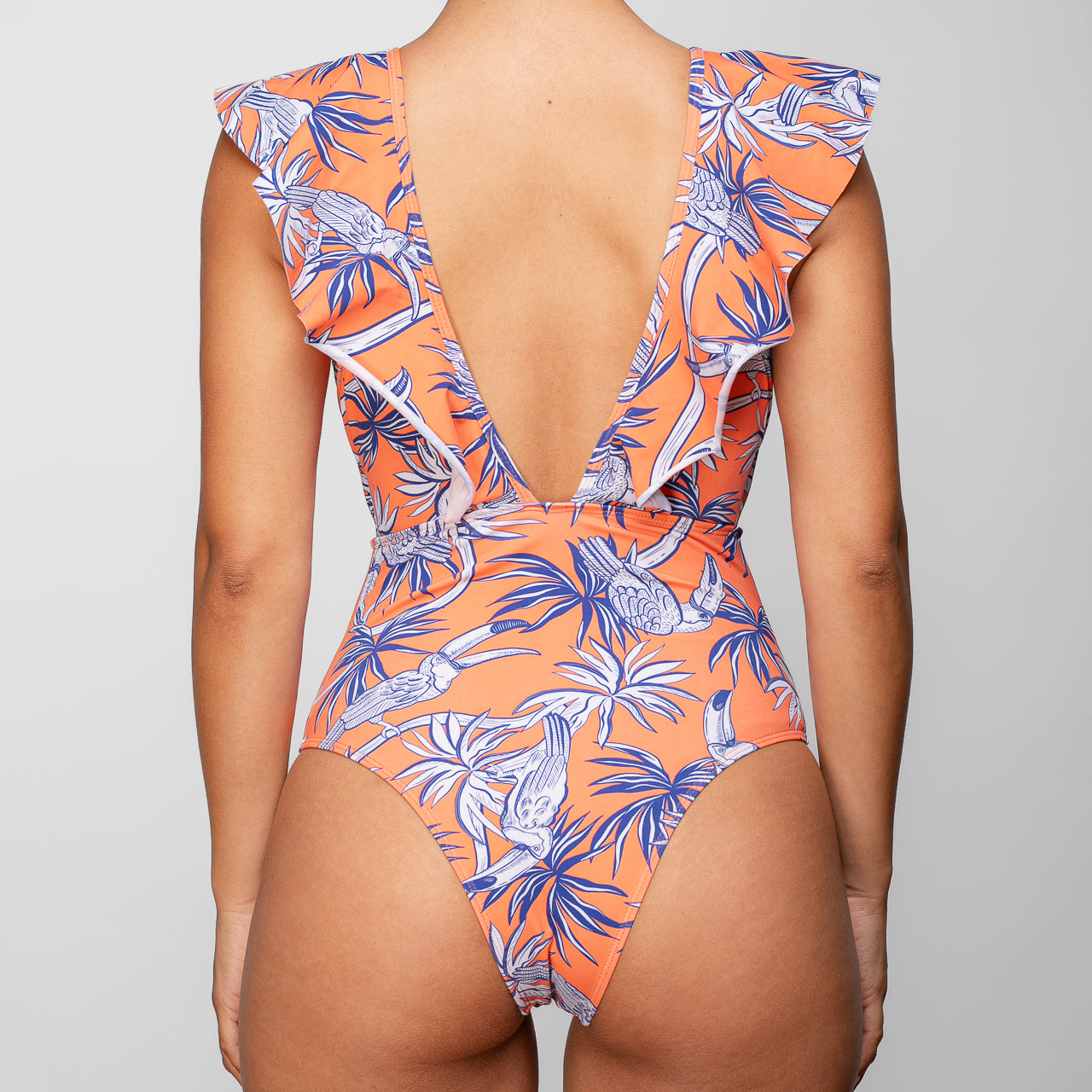 TRAJE DE BAÑO ENTERO CON VUELOS LARGOS ESTAMPADO NARANJO
