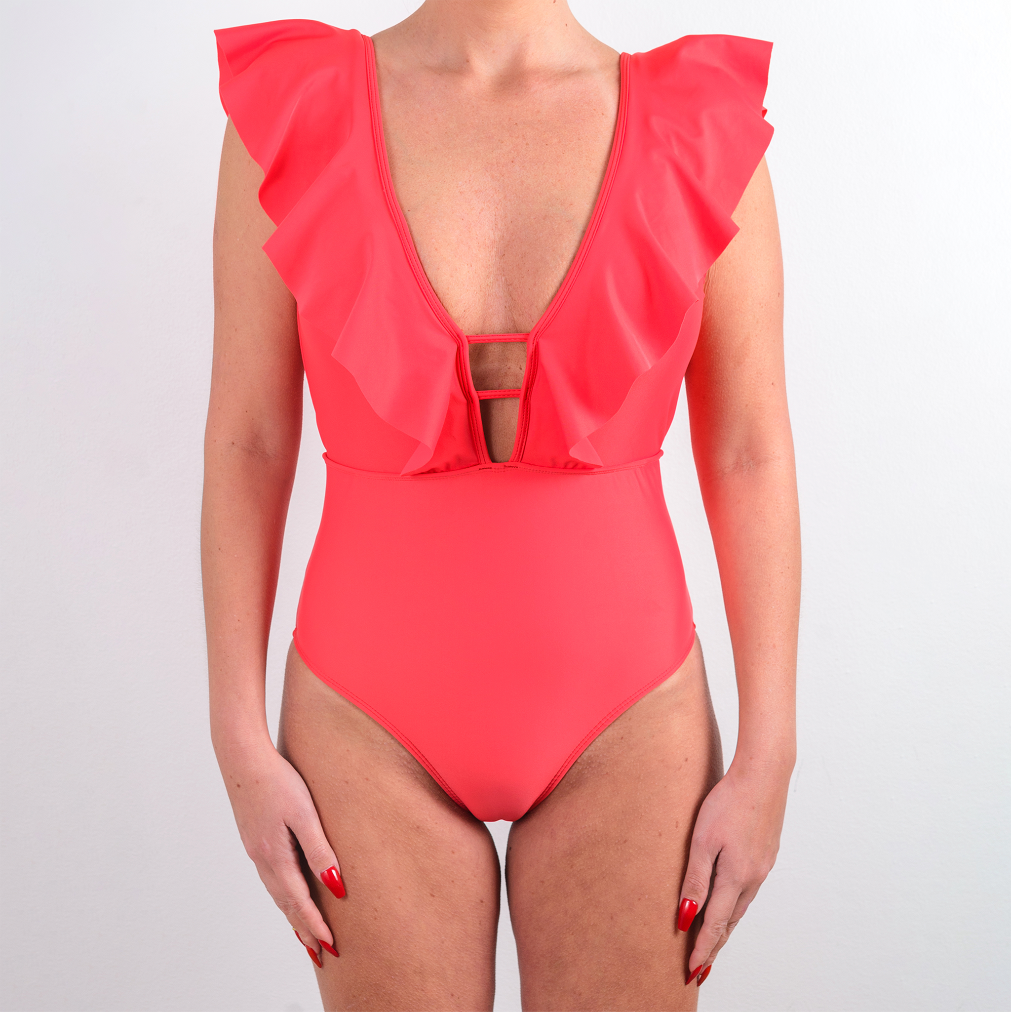 TRAJE DE BAÑO ENTERO CON VUELOS LARGOS CORAL
